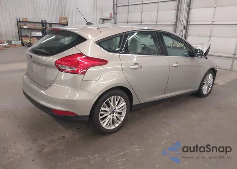 2016 Ford Focus Titanium z USA, uszkodzony, nr VIN 1FADP3N28GL326197